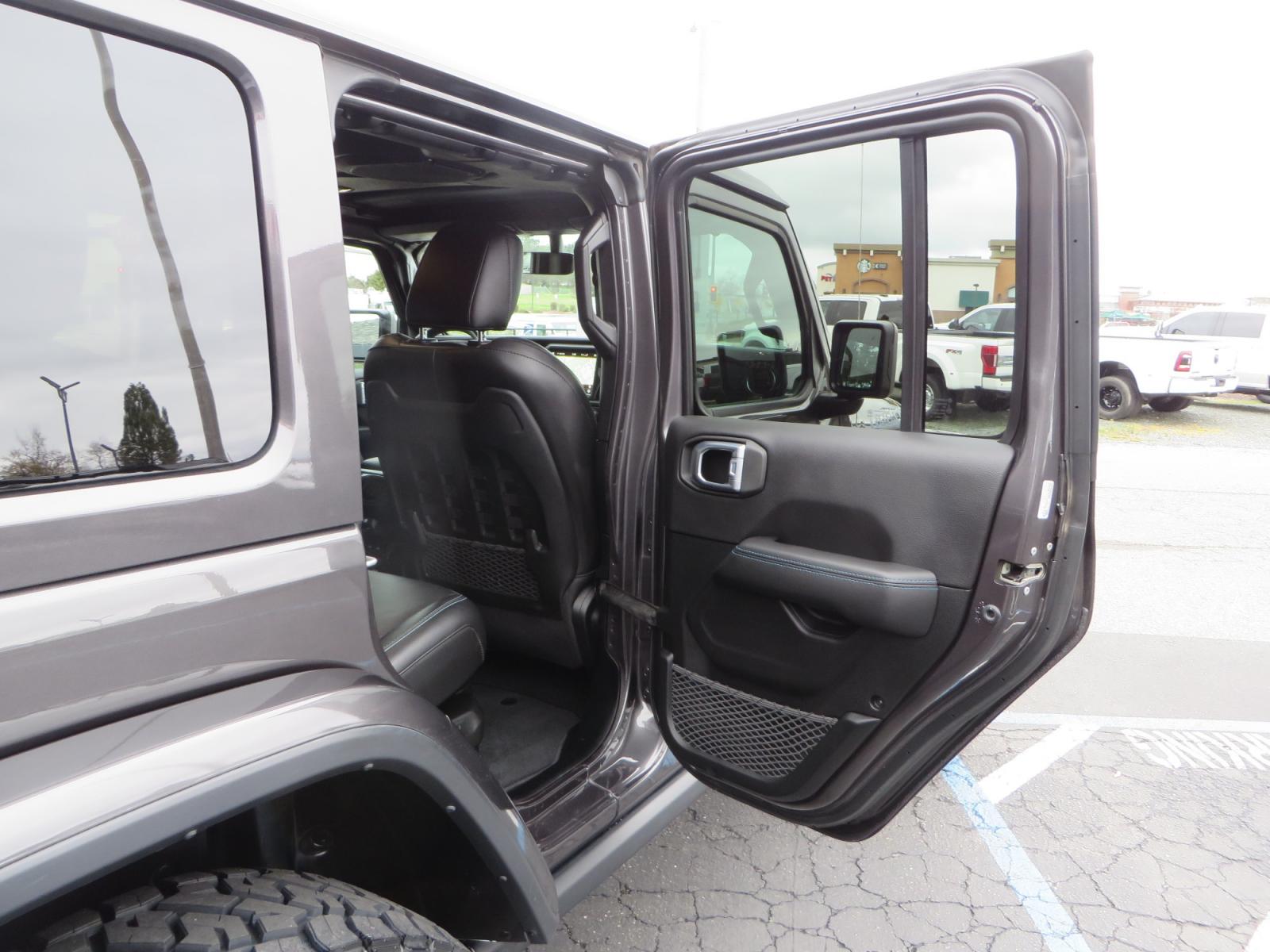 2021 CHARCOAL /BLACK Jeep Wrangler Unlimited Rubicon 4XE 4d SUV 4wd (1C4JJXR60MW) with an 2.0L L4 DOHC 16V TURBO engine, automatic transmission, located at 2630 Grass Valley Highway, Auburn, CA, 95603, (530) 508-5100, 38.937893, -121.095482 - 4XE Rubicon sitting on a Zone offroad suspension system, Fox shocks, 37" Toyo RT trail tires, 17" Method Race wheels, Teraflex Hd tire carrier, and Flat tow ready. - Photo #53
